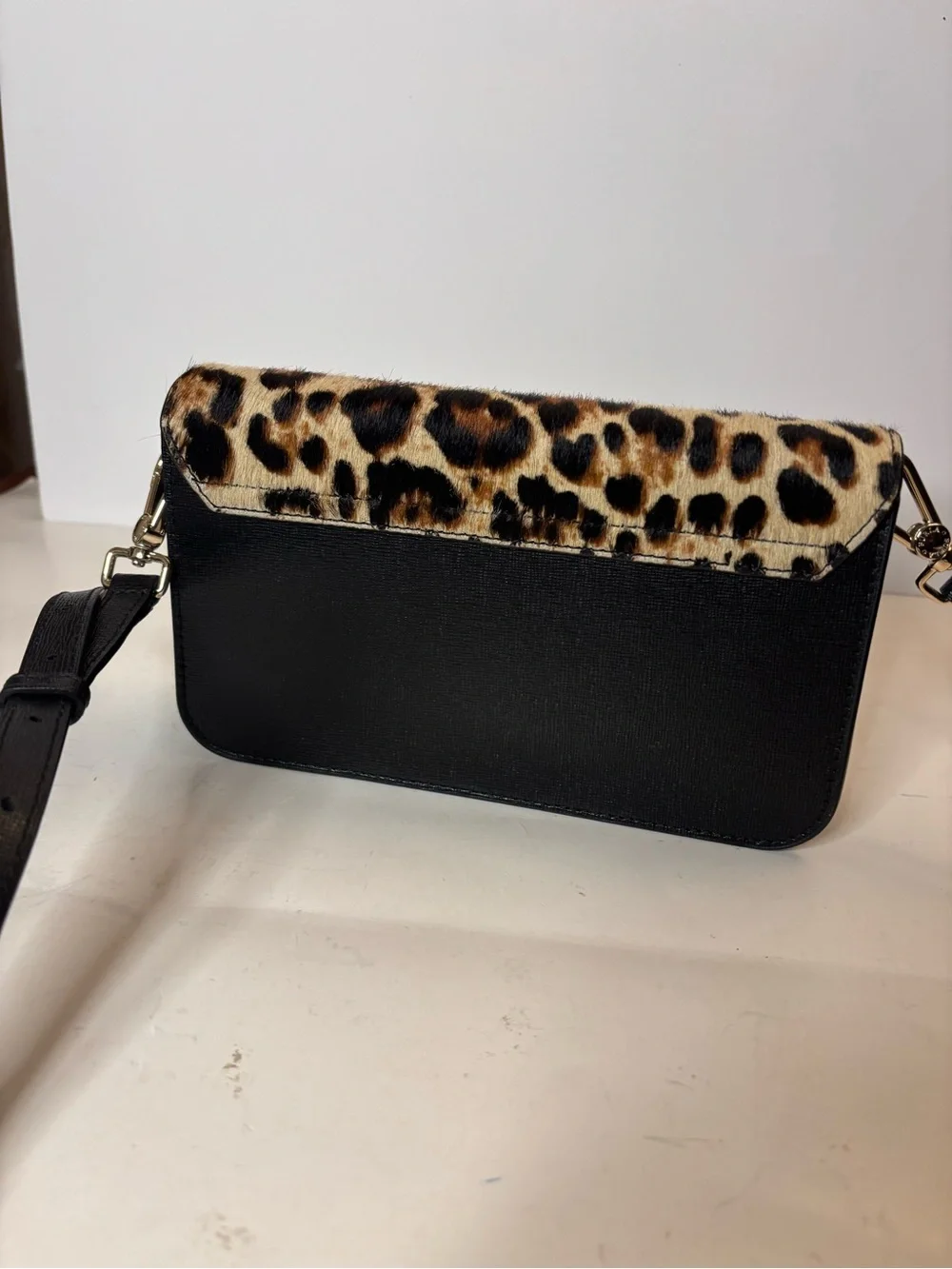 Furla Bella mini crossbody with leopard print calf hair and leather. Adjustable